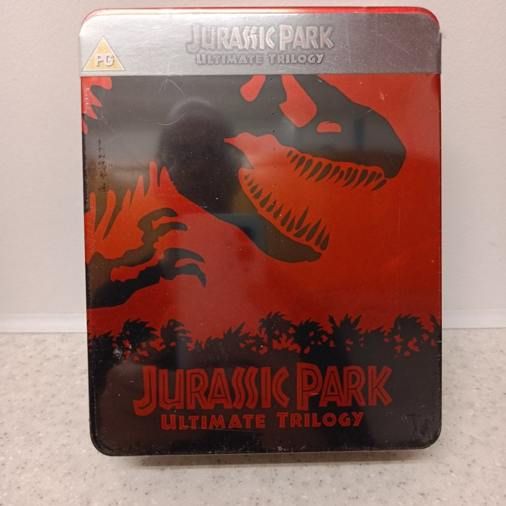 Jurassic Park Original Trilogy Blu Ray in collectable tin case with bonus items